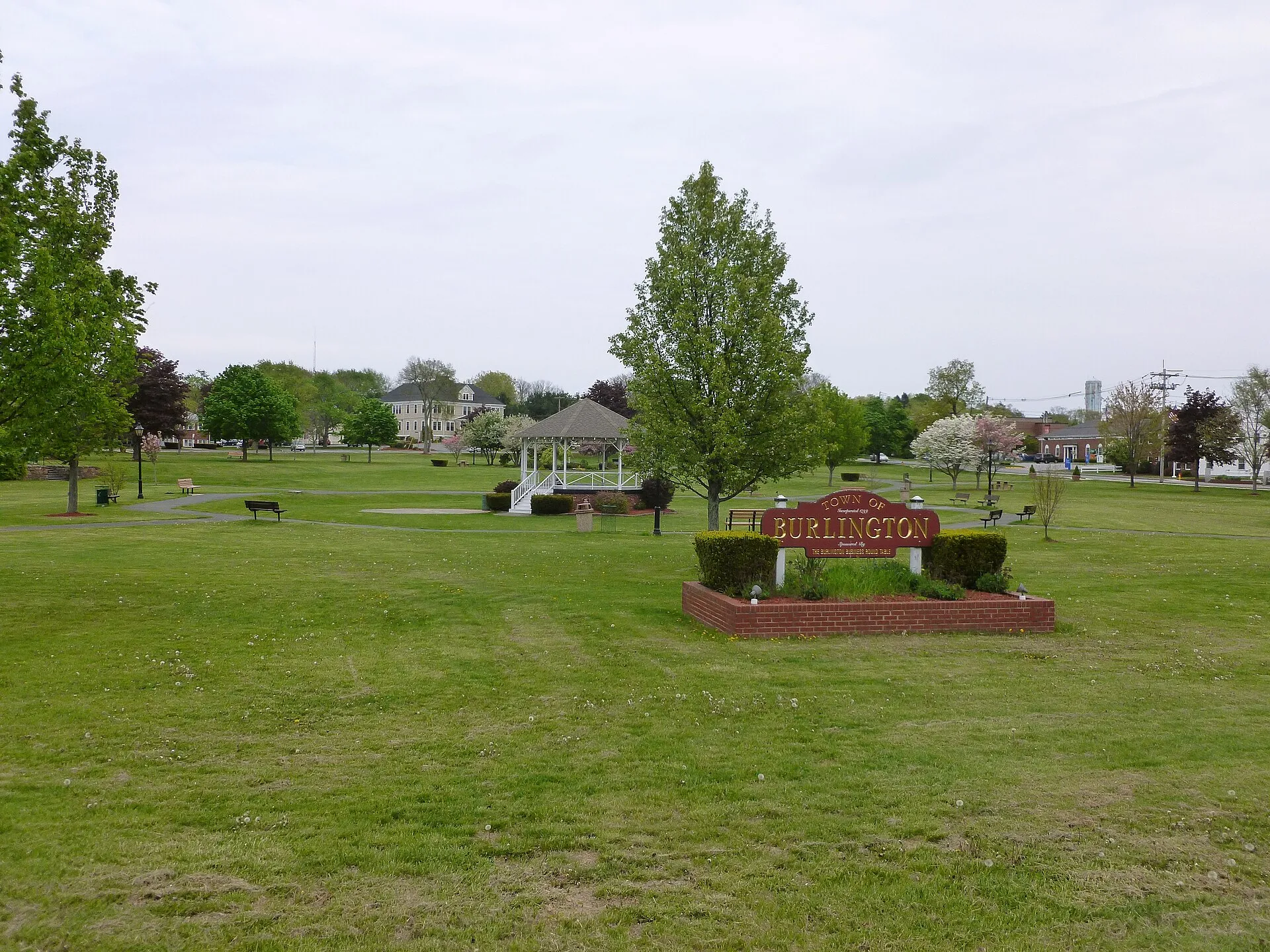 Burlington Town Common with its open green lawn, white gazebo, and Town of Burlington sign